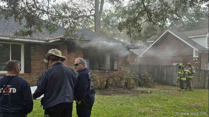 Firefighters contain house fire at home near Florida Boulevard