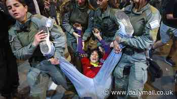 Protests break out across Israel as thousands of Israelis demand Donald Trump steps in to 'end this f***ing war now', with fiery clash erupting between demonstrators and police