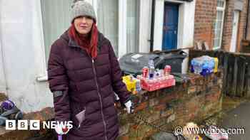 'Solemn' town rallies in flooding aftermath