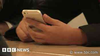 'Phone ban sees pupils talk to each other more'