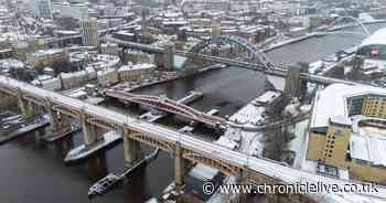 Drone pictures show River Tyne's famous bridges dusted in snow