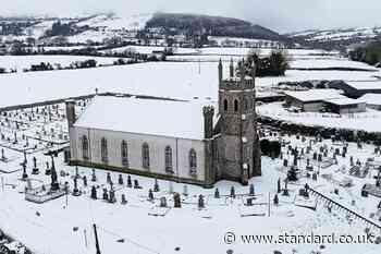 Snow and sleet leave difficult travel conditions but schools expected to reopen