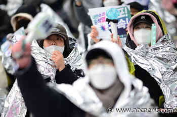 South Korean protesters brave cold and snow to demand Yoon’s ouster as detention deadline looms