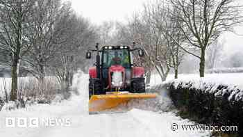 Snow brings disruption to UK flights, trains and roads as amber warning remains