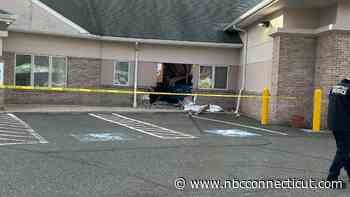 Car crashes into building in Waterbury