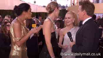 Nicole Kidman crashes Ewan McGregor's red carpet interview at the 2025 Golden Globes as Moulin Rouge co-stars reunite at awards show