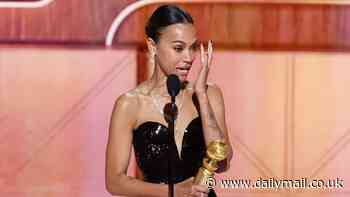 Zoe Saldana sobs after winning her first Golden Globe Award in plunging YSL gown