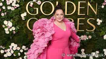 Melissa McCarthy wows in hot pink jumpsuit and ruffled cape at 2025 Golden Globes