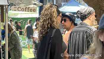 Hollywood star looks unrecognisable as she is spotted mixing with locals at Sydney's Bondi markets