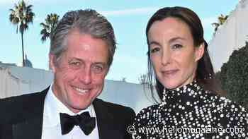 Hugh Grant, 64, puts on a brave face with wife Anna Eberstein, 41, after huge snub