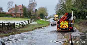 Road outside Malton badly flooded following snow and rain