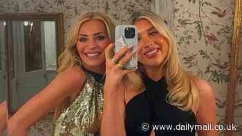 Tess Daly poses with her look-a-like daughter Phoebe, 20, while her husband Vernon Kay performs in a panto in festive update