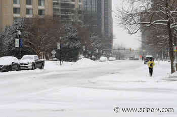 Flights canceled, plows activated as snow piles up in Arlington