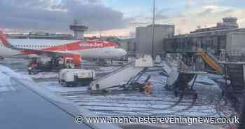 "We've been sat on the plane for over two hours": Manchester Airport passengers speak out after snow delays