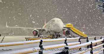 Stunning images show Manchester Airport covered in snow as flights hit by delays