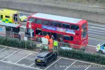 Schoolboy, 14, stabbed to death on London bus