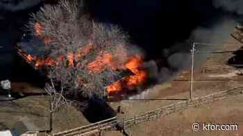 Fire crews battle heavy flames at home in Logan County