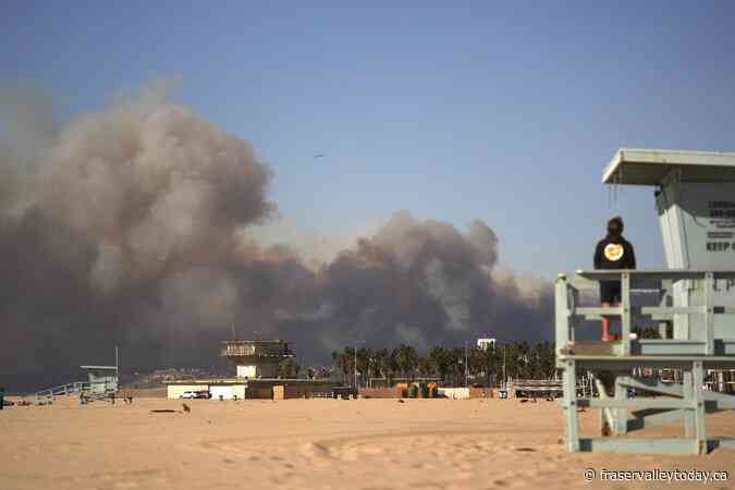 Los Angeles residents flee fire as potentially ‘life-threatening, destructive’ winds gain strength