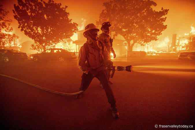 California governor says Pacific Palisades wildfire has destroyed many structures as winds kick up