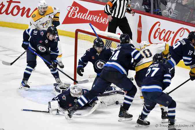 Emotional Hellebuyck shares 300-win milestone with fans, teammates