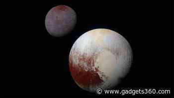 New "Kiss-and-Capture" Theory Explains Pluto's Formation of Largest Moon, Charon