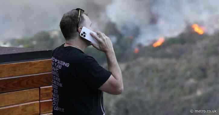 Devastated Spencer Pratt watches Hollywood wildfire blaze towards his family home