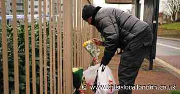 Moving pictures show flowers at Woolwich bus stop for boy, 14, stabbed to death