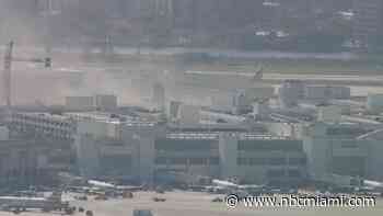 Heavy smoke in garage at Miami International Airport from reported car fire