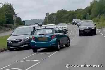 Terrifying moment M25 drunk driver swerves across lanes then barrels wrong way down busy road