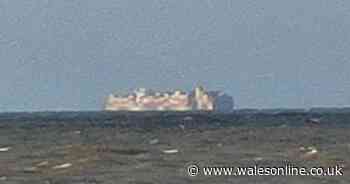 'It looks like an island' - walkers left startled by 'massive object' off Welsh coast