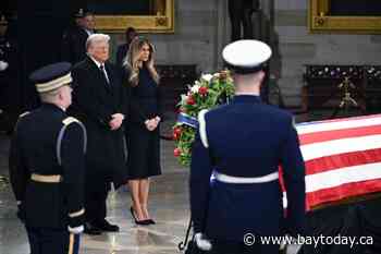 President-elect Donald Trump visits Jimmy Carter's casket in Capitol Rotunda after criticizing him