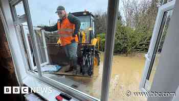 Digger driver rescues his grandparents from flood