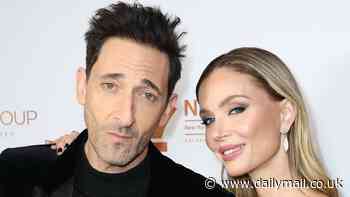 Adrien Brody and girlfriend Georgina Chapman lead A-listers at Film Critics Circle Awards in NYC despite LA fires shutting down Hollywood