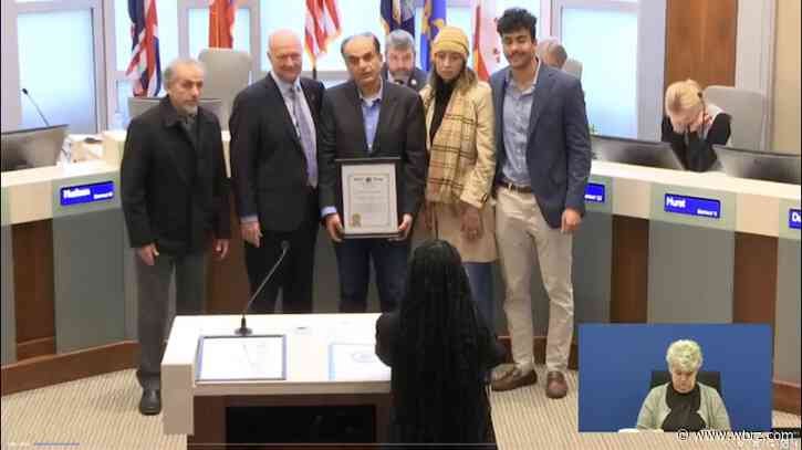 Mayor-President Sid Edwards honors Badawi, Hunter families with presentation at Metro Council meeting