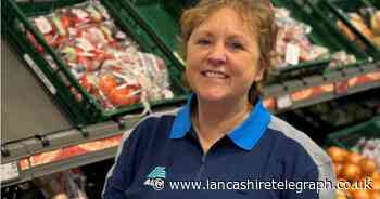 Aldi worker in Rossendale celebrates 20 years at supermarket