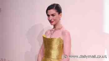 Anne Hathaway glams up in golden gown at Bulgari event in China amid LA wildfire chaos