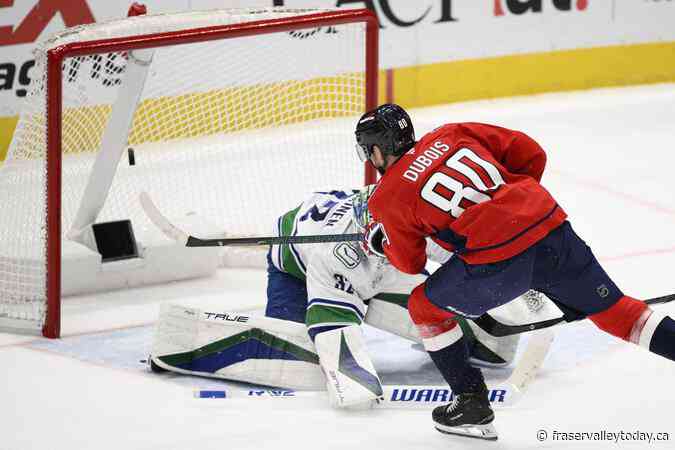 Capitals beat Canucks 2-1 in overtime