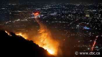 Nearly 2,000 L.A. homes burned by out-of-control wildfires