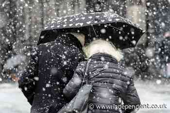 Two dead and flights cancelled as snow storm batters parts of Europe