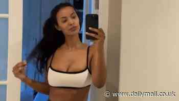 Maya Jama puts on a VERY busty display and flaunts her toned abs in white sports bra as she enjoys a bike ride in South Africa ahead of Love Island: All Stars