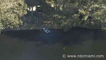 Police dive team investigating after vehicle found in canal in Fort Lauderdale