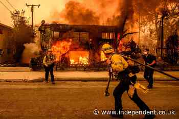 Los Angeles wildfires could worsen with wind gusts as 20 looters arrested