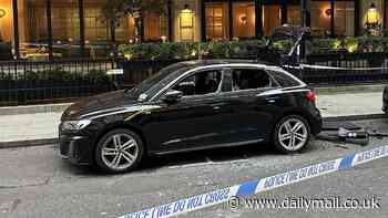 Abandoned Audi that sparked Regent Street bomb panic had been left with charging cable plugged in for a week - as traffic wardens continue to ticket it even after it was blown up