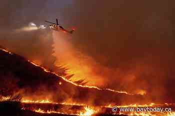 Winds that have fueled LA fires are expected to calm, giving firefighters a chance to corral flames