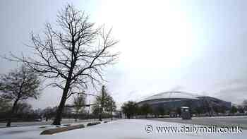 Ohio State and Texas fans brave dangerous conditions as freezing cold brings snow and sleet to Cotton Bowl