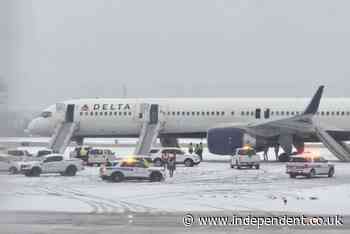 200 passengers forced to evacuate Delta plane on emergency slides due to engine issues