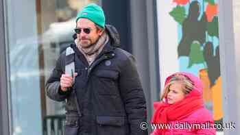 Bradley Cooper sweetly holds daughter Lea's, seven, hand while on dad duty in NYC