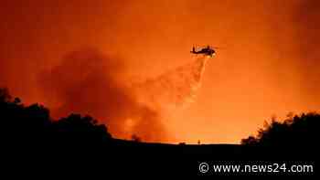 News24 | Los Angeles investigates cause of fires as curfew enforced