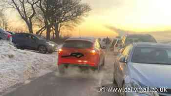 Cold weather causes chaos in the Peak District as 200 cars block gritters and councils refuse to empty frozen bins as temperatures plunge to -17C