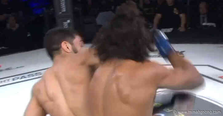 Watch fighter faceplant opponent with vicious spinning back-elbow knockout in LFA 199 main event